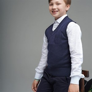 Стильные жилетки для школы которые могут стать как